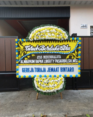 Papan Bunga Duka di Liabuku